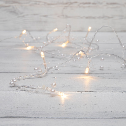 картинка Гирлянда светодиодная Жемчужинки 1,5 м,  10 LED,  прозрачный ПВХ,  цвет свечения теплый белый,  2 х АА (батарейки не в комплекте) NEON-NIGHT от магазина Сантехстрой