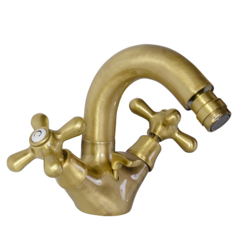 картинка Nicolazzi Nuova Brenta Смеситель для биде с 2мя ручками, поворотный излив: 132мм, с донным клапаном, цвет: бронза от магазина Сантехстрой