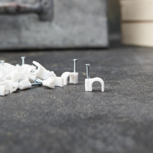 картинка Крепеж кабеля круглый 7 мм,  белый (упак.  50 шт) REXANT от магазина Сантехстрой