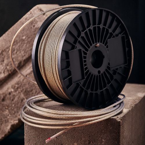 картинка Трос стальной в ПВХ оплетке d=4,0 мм,  прозрачный (бухта 100 м) REXANT от магазина Сантехстрой