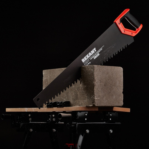 картинка Ножовка по пенобетону 700мм,  защитное покрытие,  твердосплавные напайки на зубья,  двухкомпонентная рукоятка REXANT от магазина Сантехстрой
