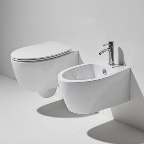 картинка Унитаз подвесной Simas Lft Spazio 350х520х390 безободковый, с креплением F85, цвет белый (LFT18bi) от магазина Сантехстрой