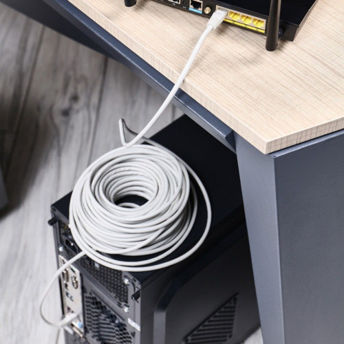 картинка Шнур коммутационный,  патч-корд U/UTP RJ45-RJ45, CAT 5e,  25м,  PVC серый REXANT от магазина Сантехстрой