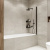 картинка RX15070CBL-23 Reflexion ограждение на ванну 150х70см Slider. Прозрачное закаленное стекло 5мм от магазина Сантехстрой