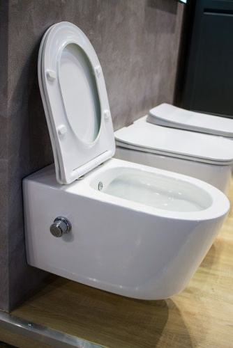 картинка Унитаз подвесной безободковый с функцией биде, с креплением ART&MAX ZOE AM9322C1CHR от магазина Сантехстрой