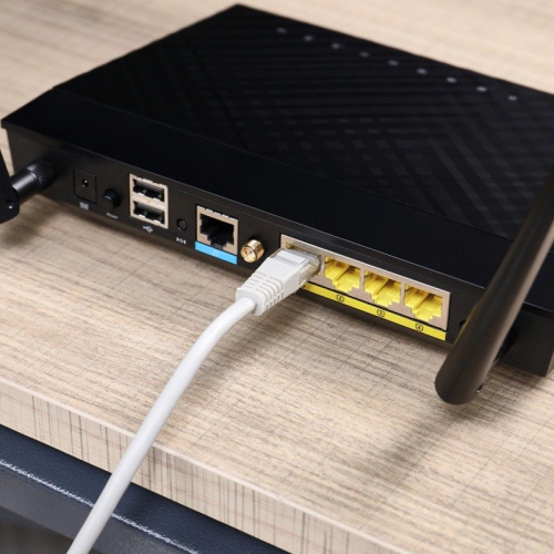 картинка Шнур коммутационный,  патч-корд U/UTP RJ45-RJ45, CAT 5e,  25м,  PVC серый REXANT от магазина Сантехстрой