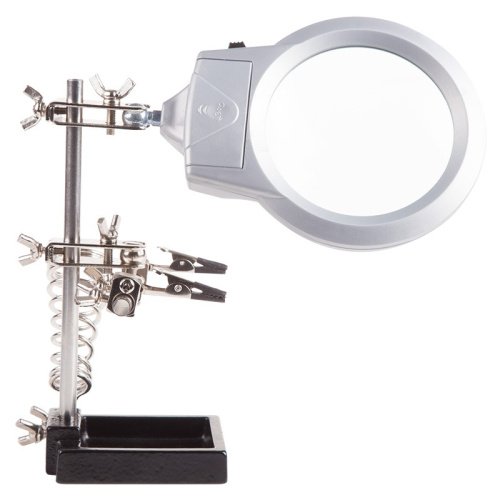 картинка Держатель «Третья рука» REXANT,  2 зажима,  чугун,  лупа 90 мм,  подставка паяльника,  LED подсветка от магазина Сантехстрой