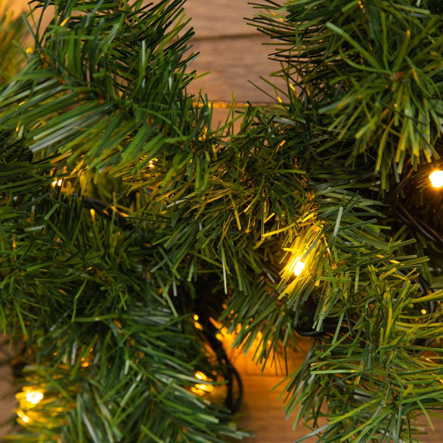 картинка Еловый шлейф искусственный 2,7 м теплое белое свечение 80 LED от магазина Сантехстрой